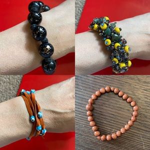 Bundle of four beaded bracelets.